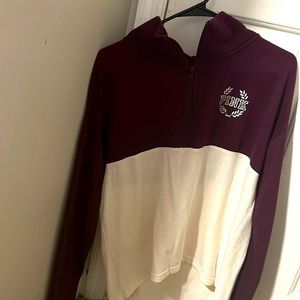 A purple Victoria secrets shirt/ jacket